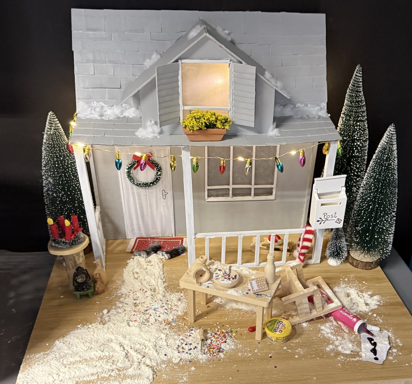 Home-made Christmas miniature house with fairy lights